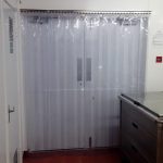 Perforated strip screen fly door